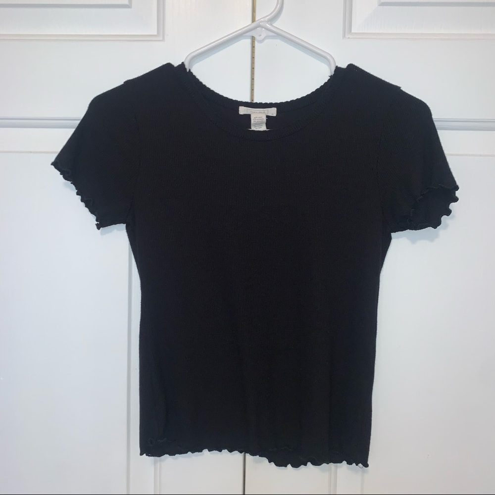 Black tee with ruffles on the sleeves and bottom